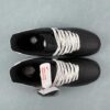 nike-air-force-1-low-mca-off-negras-vista-frontal